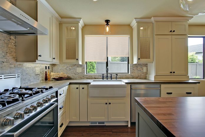 kitchen cabinets with gray floor